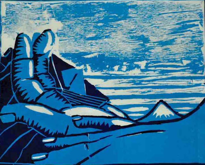Woodcut print of hand and landscape by student